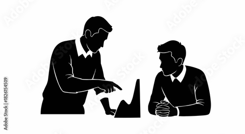 Two businessmen collaborating on a project discussing charts.