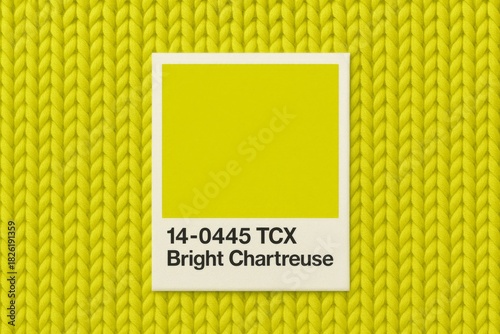 Chartreuse color sample on knitted texture background