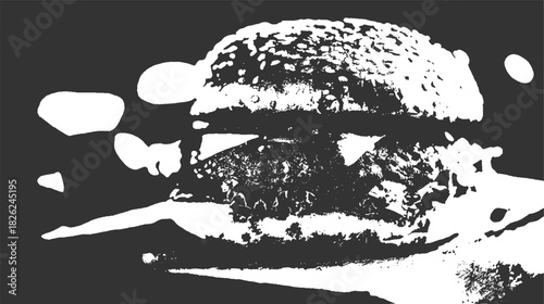 Black and white close up of a hamburger with sesame seed bun and cheese food fast