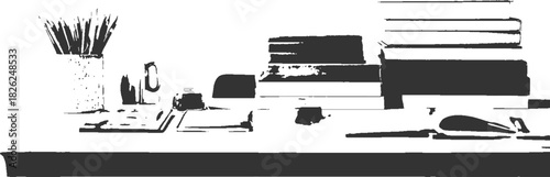 Dark silhouette of a desk with books pens and a vase of reeds table surface