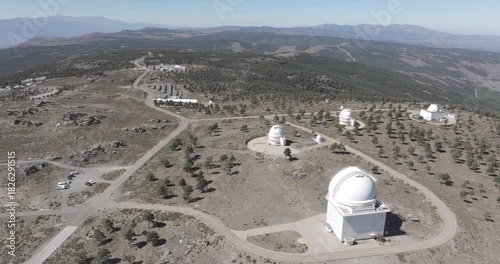 Aerial drone shot towards Calar Alto Observatory in the Sierra de Los Filabres mountain range in Almeria, Andalusia, Spain. Largest astronomical observatory in Europe