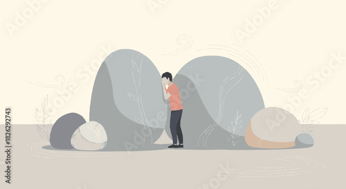 Scared man hiding behind big rocks feeling fear and anxiety.
