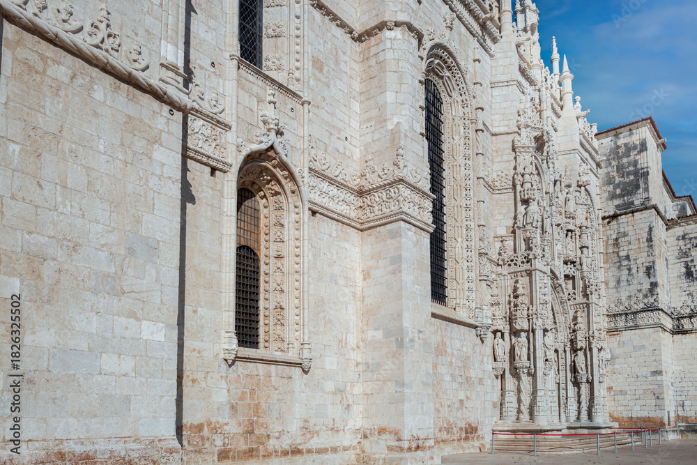 Fototapeta premium Architectural details of the Jeronimos Monastery, built in the early 16th century and continued for a hundred years, in Manueline architecture, by King Manuel I. Lisbon, Portugal, 2023