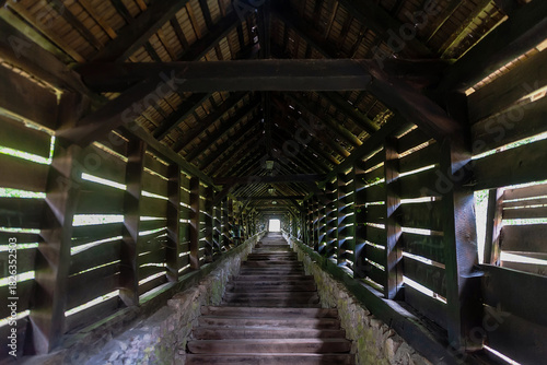 Wallpaper Mural Long wooden tunnel  leading upstairs, Sighisoara, Romania Torontodigital.ca