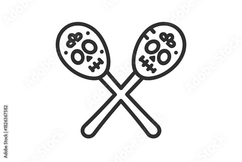 Crossed maracas decorated with traditional sugar skull design for Mexican celebration