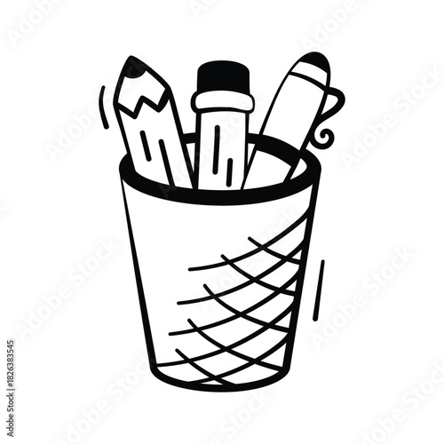 Cup with pencils and pens symbolizing school supplies and creative writing