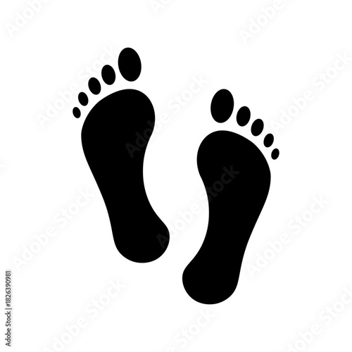 Silhouette of two human footprints symbolizing walking, movement, and steps