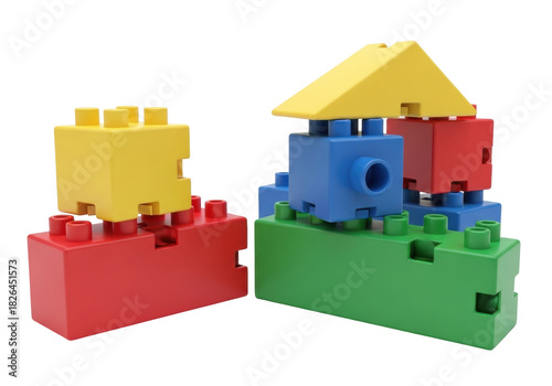 Isolated colorful plastic blocks toys on floor creating house structure for kids play