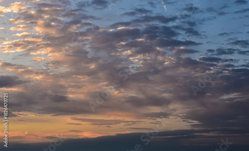 Dreamlike late afternoon sky illuminated by radiant sunset glow and light