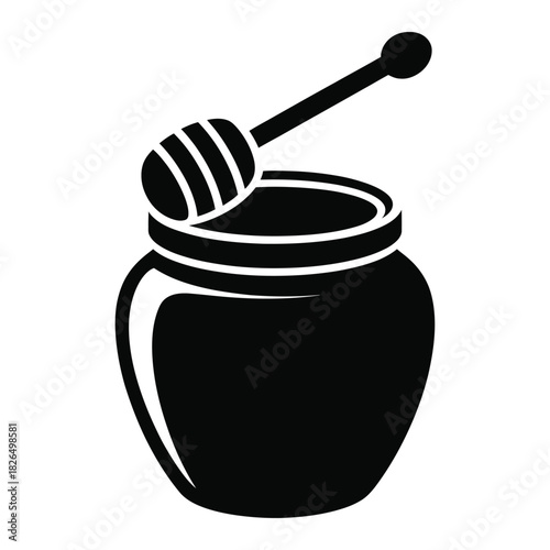 Honey pot with dipper isolated on white background, a sweet and natural treat for your breakfast or dessert