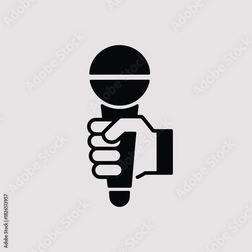 Hand holding microphone icon concept design