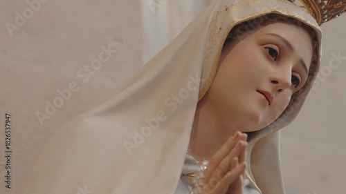 serene statue of our lady of fatima in a calm prayerful moment