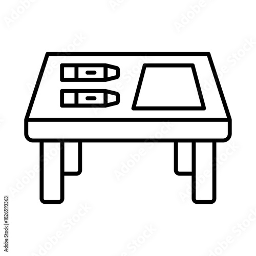 Table with crayons and paper