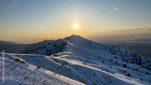Sunset over the mountain peak