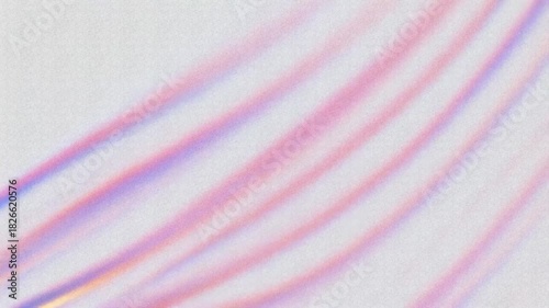 Abstract colorful background with soft blurred lines and pastel shades.