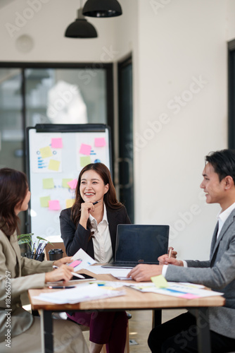 Group of male and female lawyers are giving legal advice in an office.