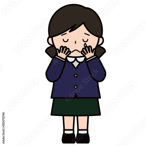 顔を覆って泣いている女の子