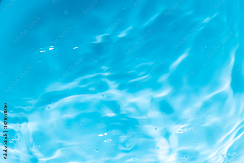 Obraz premium Macro blue water wave texture,Banner of Blue Abstract water background texture with ripples and waves,Blue macro water wave texture and circles.