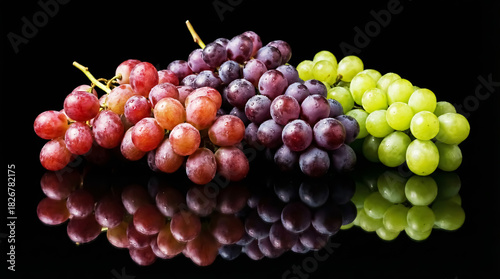 Wallpaper Mural Bunch of red and green grapes on a black background with reflection Torontodigital.ca