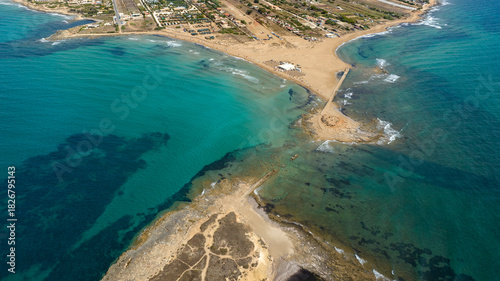 Photos Aerial view of the isthmus separating Isola delle Correnti from Sicily, Italy