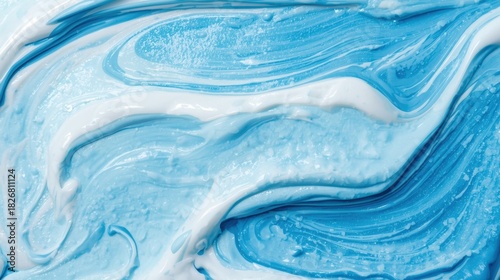 Macro view of blue and white liquid blending. Concept of moisturizing cream, acrylic art or fresh hygiene background.