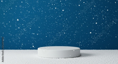 Minimalist white podium or pedestal on a snowy surface against a deep blue background with falling snow