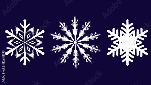 Three white snowflakes on a dark blue background
