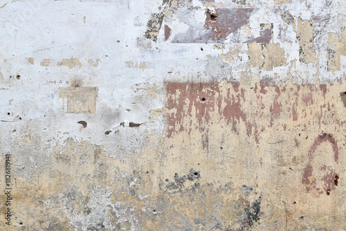 old weathered beige wall texture with peeling paint and grunge surface