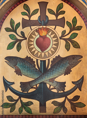 SALZBURG, AUSTIRA - SEPTEMBER 7, 2025: The Cross, fisches, anchor and heart of Jesus painted on the wood in the church Franziskanerkirche by unknown artist. 
