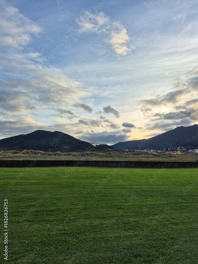 Naklejka premium mountain landscape with clouds