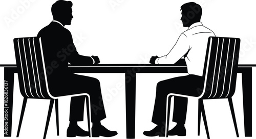 Business people discussion silhouette, two men sitting across a table, interview or negotiation meeting