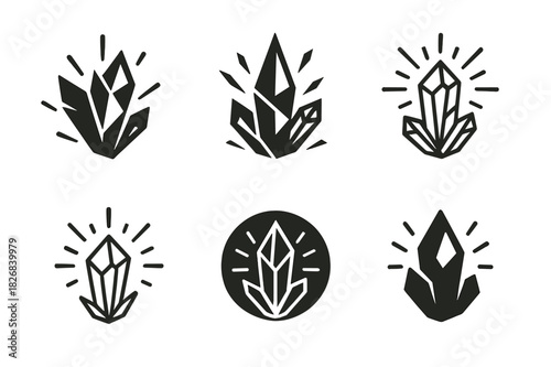 Crystalline Energy Logos. Explosion of energy from crystals. Icon set. Set Logo of crystal energy: fractured crystal with energy lines. harmonious logo