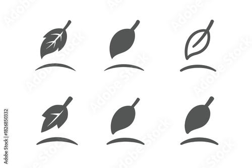 Melancholy Leaf Emblems. Melancholy. Icon set. Set Logo of Melancholy: lone leaf falling. harmonious logo variations of the same emblematic concept, each with