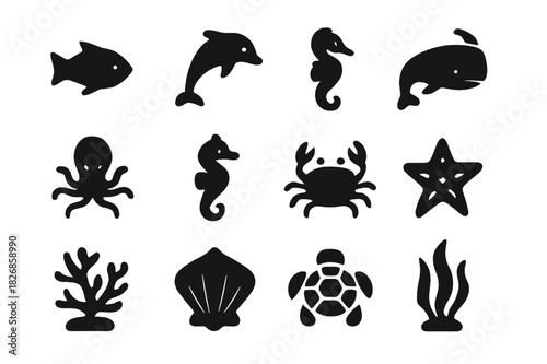 Marine Icons Collection. Ocean Wildlife. Solid icon set of fish, dolphin, whale, octopus, seahorse, crab, jellyfish, starfish, turtle, coral, shell, seaweed.