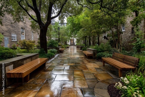 Beautiful Stone Pathway Through a Peaceful Garden With Benches and Greenery i...