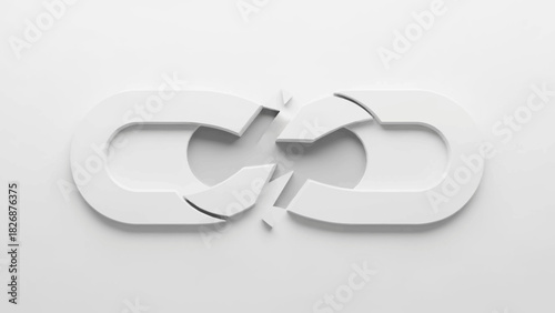 Broken white chain link on a plain gray background with shadows, close-up view.