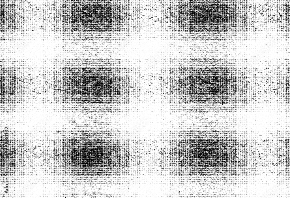 Fototapeta premium A halftone grunge texture made of dense scattered dots, perfect for vintage effects, screen-print looks, distressed overlays, and retro graphic design projects.