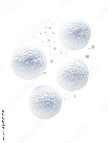 Five spherical snowballs in different sizes mid-air fall on transparent background