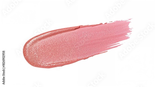 A pink cosmetic product swatch or smear with a shiny, metallic finish.