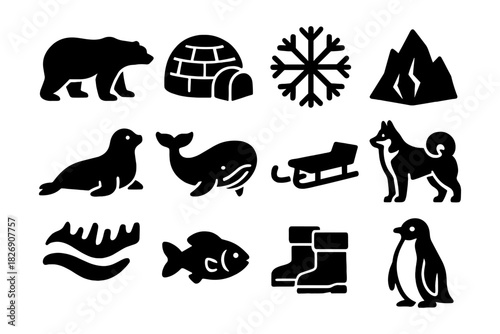 Silhouette icons of arctic animals and symbols in winter theme