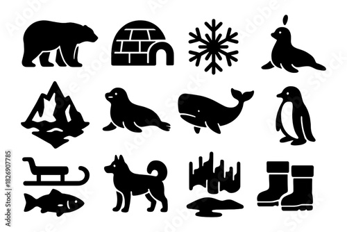 Silhouette icons of arctic wildlife and winter elements in black