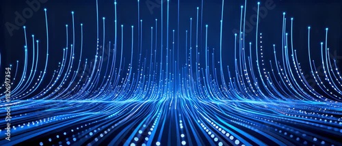Abstract blue digital data streams flowing upwards and outwards from a dark reflective surface, representing information technology and the flow of digital information in a futuristic concept