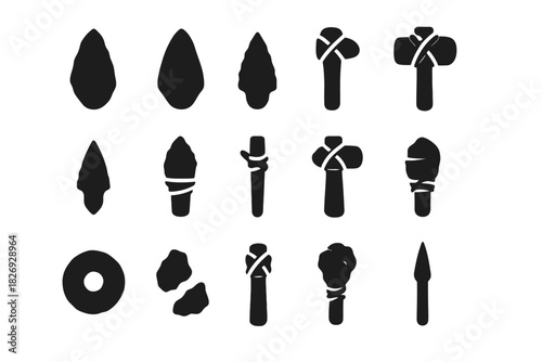 Silhouettes of ancient prehistoric stone tools and weapons