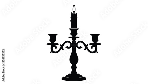 Vintage ornate candelabra with lit candle black silhouette isolated on white background