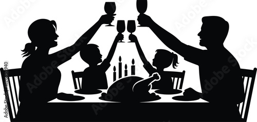 Family silhouette toasting at dinner table with turkey and candles