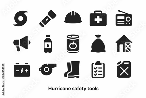 Essential hurricane safety tools: kit, helmet, radio, canned food, flashlight, battery, whistle