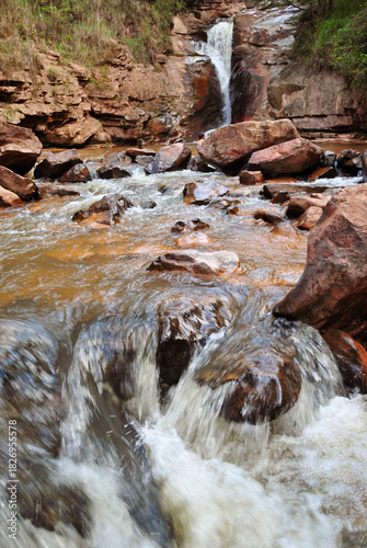 waterfall in the mountains.