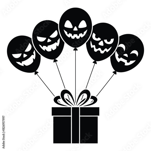 Black halloween jack o lantern balloons tied to gift box