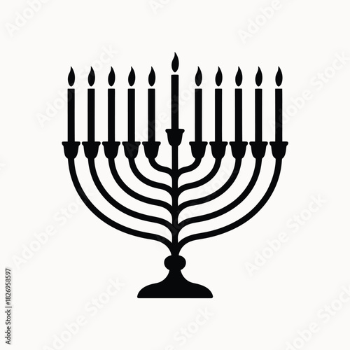 Black silhouette of a hanukkah menorah with nine candles lit