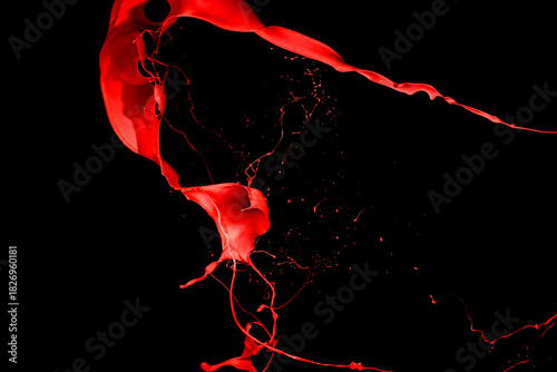 Red paint splash isolated on black background.